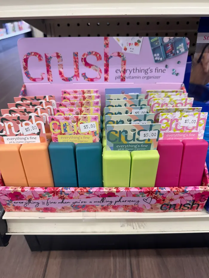 Colorful Crush pill and vitamin organizers on display at City Drugs