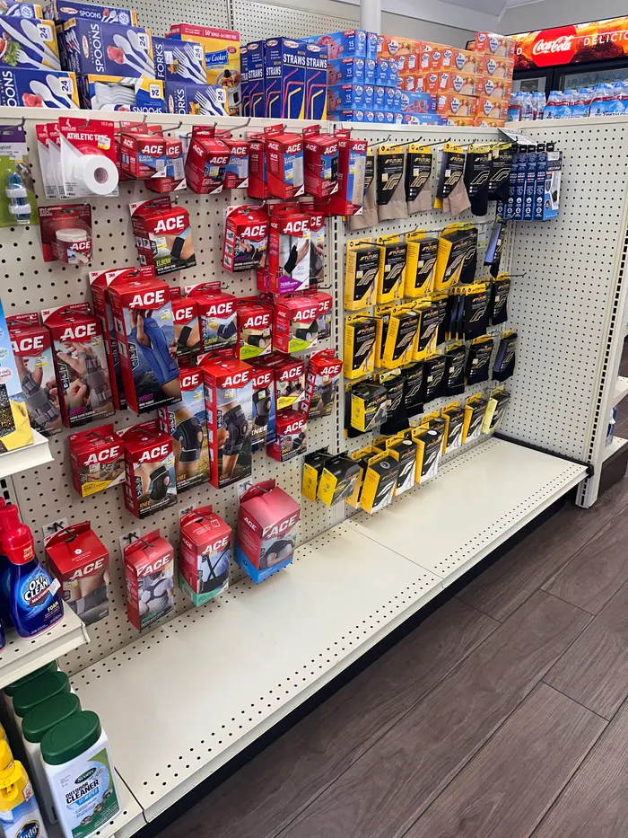 Store aisle at City Drugs stocked with over-the-counter products