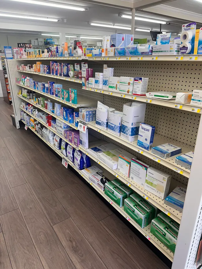 Store aisle at City Drugs stocked with over-the-counter products