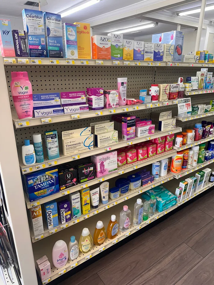 Store aisle at City Drugs stocked with over-the-counter products