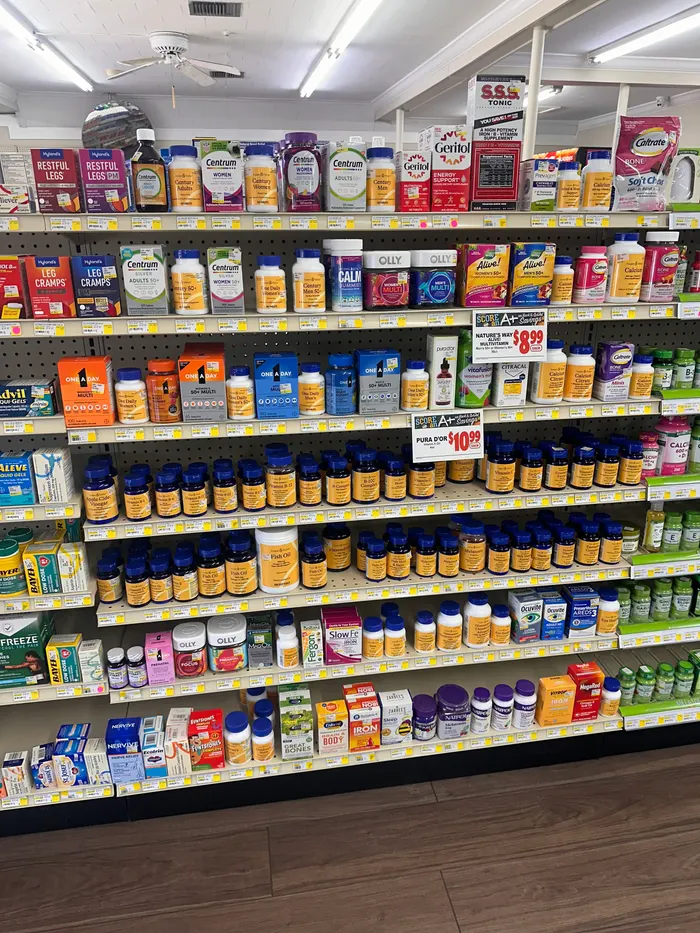 Store aisle at City Drugs stocked with over-the-counter products