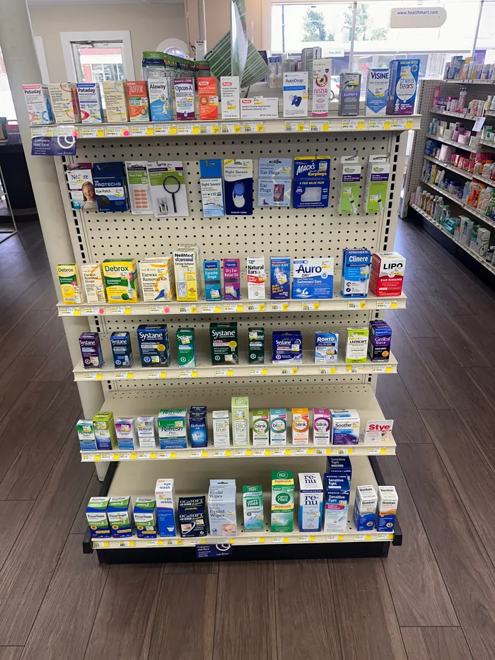 Store aisle at City Drugs stocked with over-the-counter products