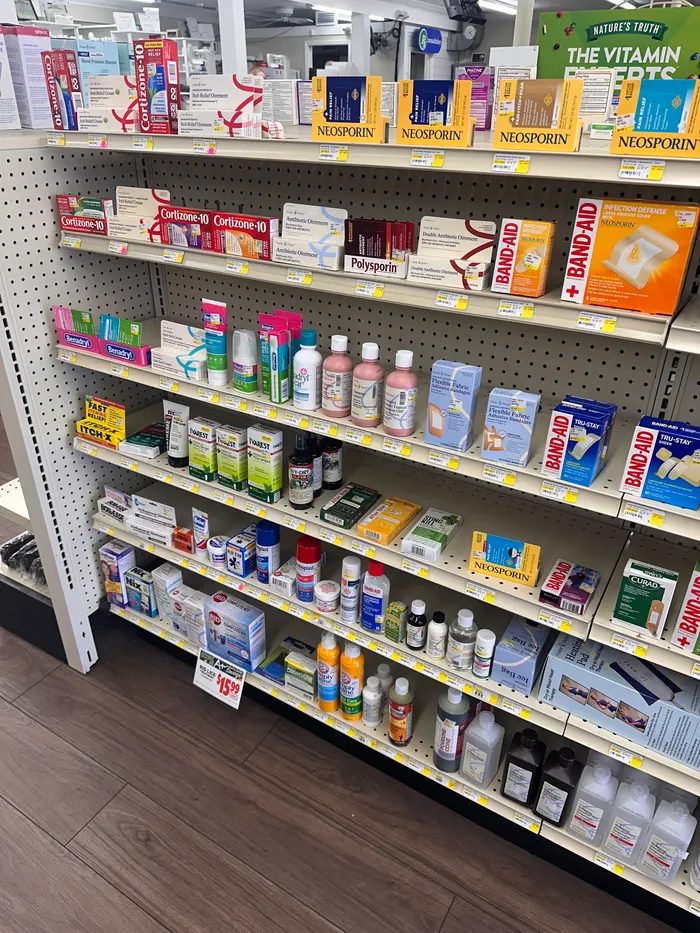 Store aisle at City Drugs stocked with over-the-counter products